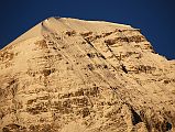 18 Tsha Tung Summit Close Up At Sunrise From Drakpochen Tsha Tung (5995m) summit area glows at sunrise from Drakpochen. Tsha Tung was climbed for the first time by Jo Cleere and Victor Saunders on June 19, 2005 via the East Ridge.
